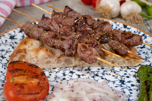 Traditional Turkish grilled meat shish kebab Turkish grilled meat shish kebab on plate Chicken Shish Kebab stock pictures, royalty-free photos & images