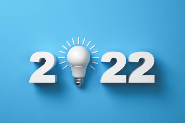 istock 2022 and white lamp on a blue background. 1365123696