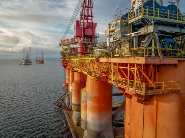 Close Up Aerial View of an Oil and Gas Drilling Rig A drilling rig and platform used in the oil and gas industry for offshore fuel exploration north sea oil and gas stock pictures, royalty-free photos & images