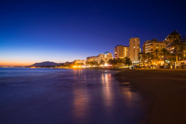 istock Marbella sunset beach in Playa de la fontanilla in Malaga 1365125699