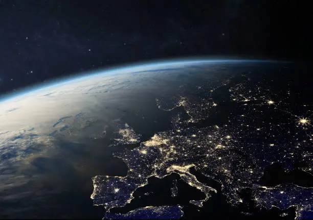 Planet Earth from the space at night. Europe at night viewed from space with city lights in Germany, France, Spain, Italy, Portugal, United Kingdom, Ireland, Greece, Turkey, Denmark, Austria, UK and other countries. Elements of this image furnished by NASA. ______ Url(s): "https://images.nasa.gov/details-iss040e074978.html"https://photojournal.jpl.nasa.gov/catalog/PIA17257"https://svs.gsfc.nasa.gov/30028"Software: Adobe Photoshop CC 2015. Knoll light factory. Adobe After Effects CC 2017.