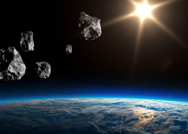 istock Asteroids near planet Earth. 1365125758