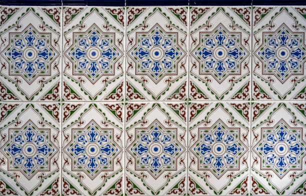 Full frame image of a tiled wall in Spain with geometric figures.