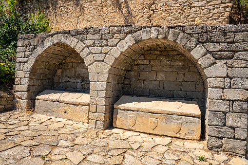 Stone tombs from Roderico Mur and Marica lovers of Graus village in Huesca de Aragon of Spain in the Ribagorza region