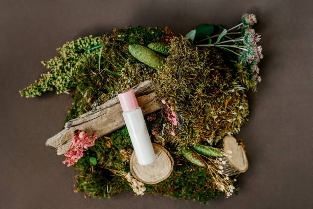 istock Cosmetics bottle with cream, sustainable design with moss. 1365132824