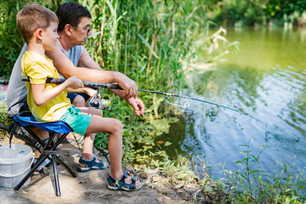 istock Fishing with my grandfather 1365133595