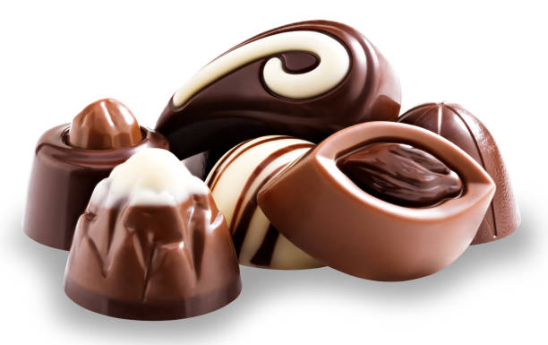 istock chocolate candies isolated on white background. Clipping path 1365134361