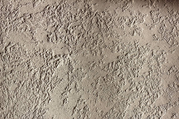 istock Gray concrete wall. The texture can be used as a background 1365134621