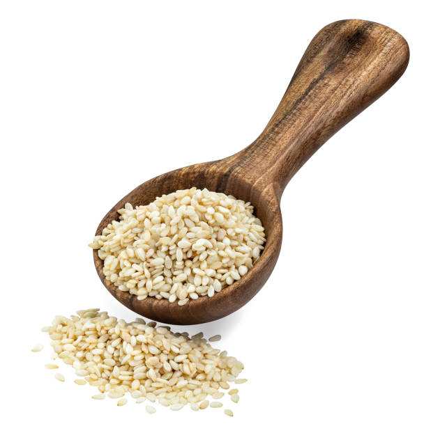 istock white sesame seeds in wooden spoon isolated 1365136821