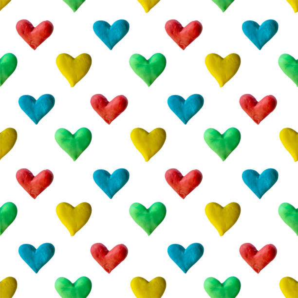 istock Plasticine heart pattern. Love illustration from modeling dough. Crafts. Valentine's Day or wedding 1365141023