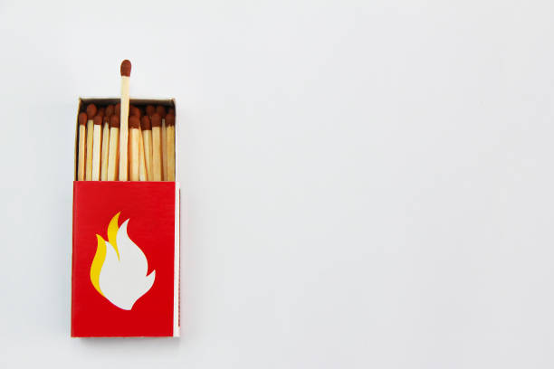 istock wooden matches in a paper box 1365141103