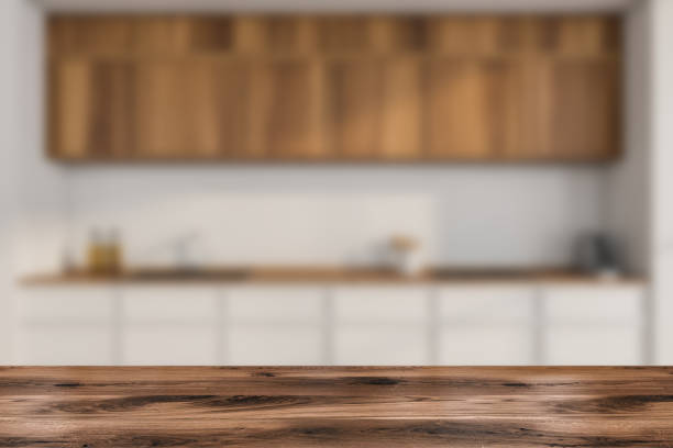 istock Table for product display with white and wood kitchen on background 1365152642