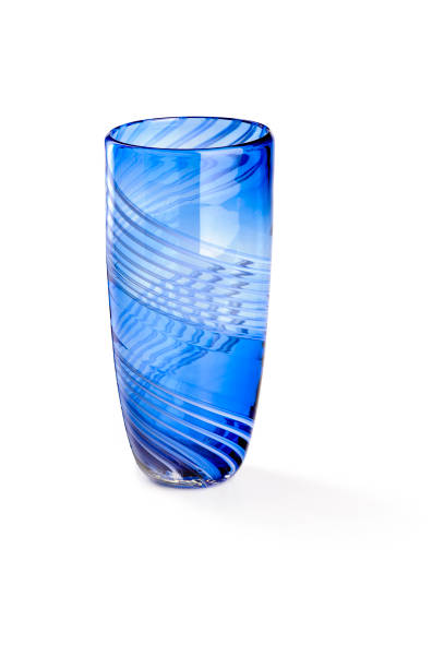 istock Blue glass vase with decorative lines around, isolated 1365153418