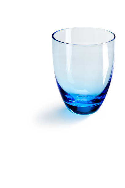 istock Tulip shaped blue glass cup, isolated 1365154008