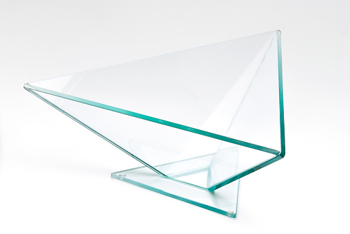 Modern glass vase with triangular shape, isolated