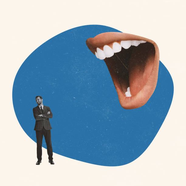 istock Contemporary art collage. Businessman ignoring huge shouting mouth 1365154833