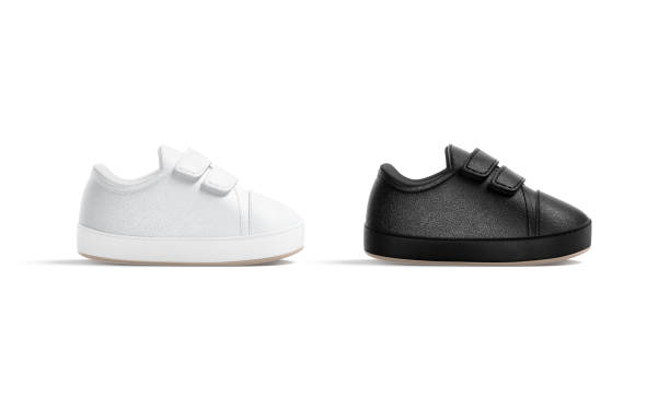 istock Blank black and white baby shoes mockup, profile view 1365156203