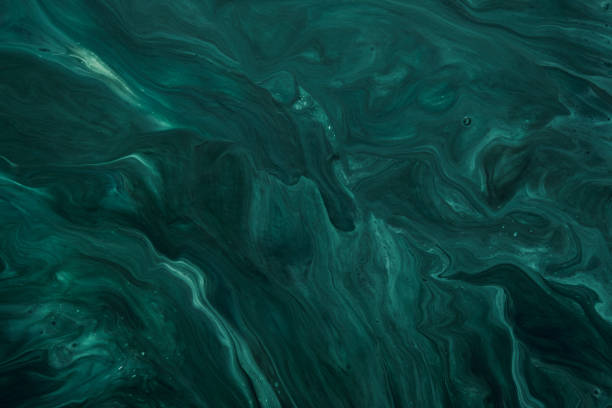 istock Fluid Art. Liquid Velvet Jade green abstract drips and wave. Marble effect background or texture 1365156875