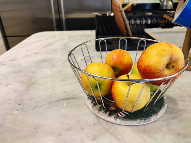istock Fresh organic apples in metal basket 1365157684