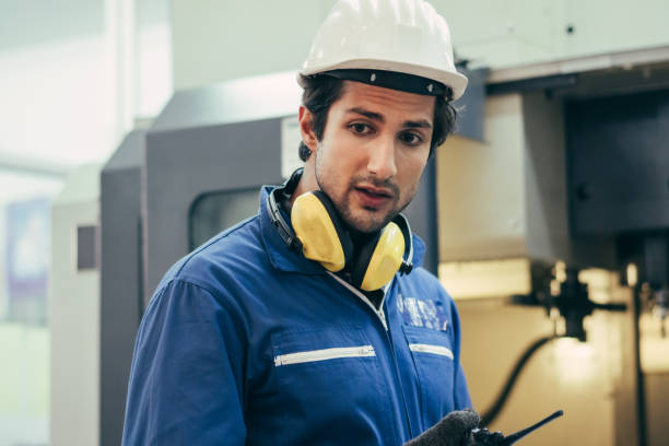 istock Male factory engineer at heavy industrial construction 1365158779