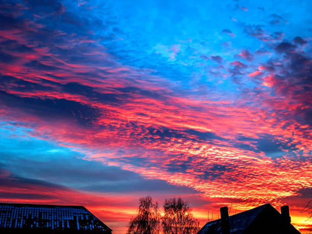 istock bright dramatic flaming red-blue skies at sunset 1365158828