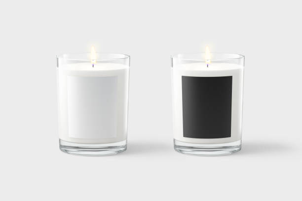 黒い白いラベルのモックアップとガラス瓶の空白のろうそく - aromatherapy candles ストックフォトと画像