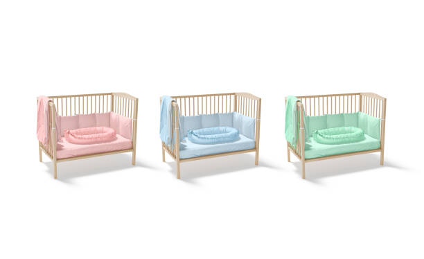 istock Blank wood cot with colored crib sheet and nest mockup 1365160589