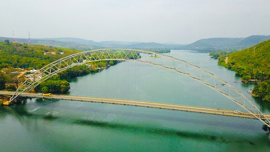 An aerial view of the Volta (Adomi) Bridge which is the first permanent bridge to span the Volta River and is Ghana's longest suspension bridge.