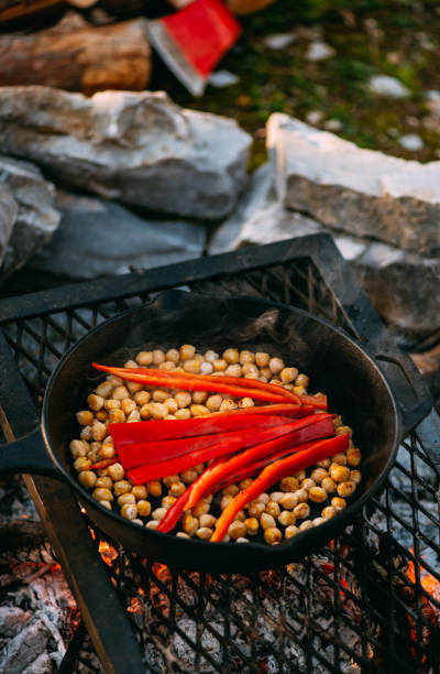 istock Preparing Chickpea Meal by the Campfire 1365166275
