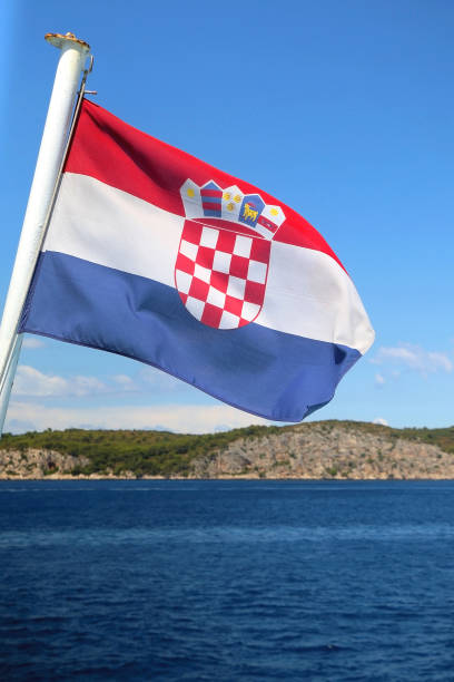 istock Croatian Flag and Adriatic Sea 1365167438