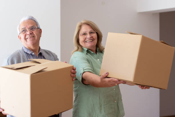 istock Thrilled elderly couple moving into new house 1365167588