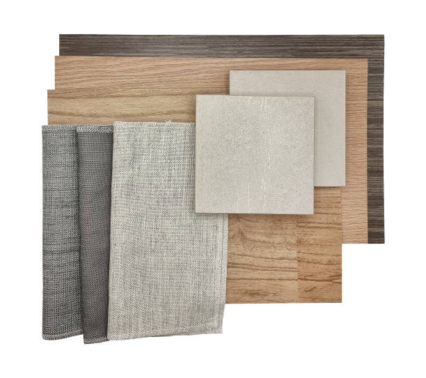 istock close up interior material combination contains grey tone of drapery curtain samples, travertine granite tiles, oak vinyl floor tile, wooden veneer samples isolated on background with clipping path. 1365169681