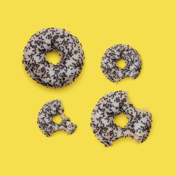 istock Colorful delicious donut in a row, bitten. 1365170463