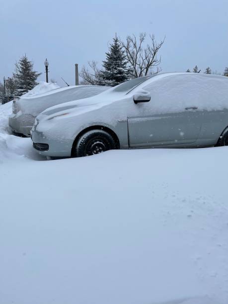 istock Car in snow covered parking lot 1365170593