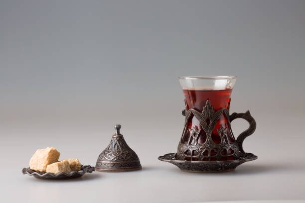istock Traditional Turkish cup with freshly brewed black tea and pressed sugar on a saucer 1365170643