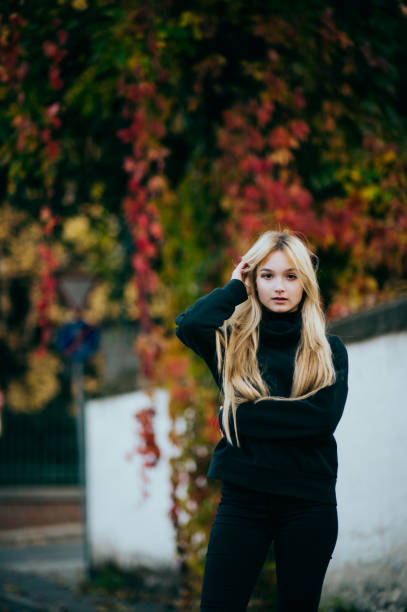 istock young girl autumn portrait 1365173317