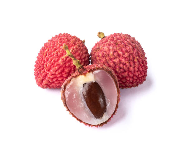 istock Lychees with cut fruit isolated over white background 1365173360