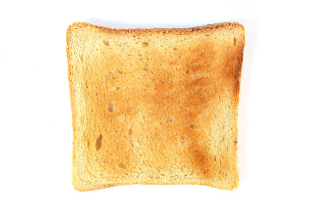 istock Single slice of toast bread isolated on white 1365173861