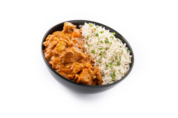 istock Indian butter chicken in black bowl 1365175052