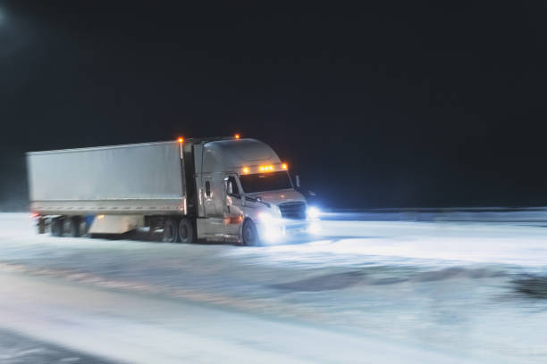 istock Semi Truck on Highway in Winter 1365180006