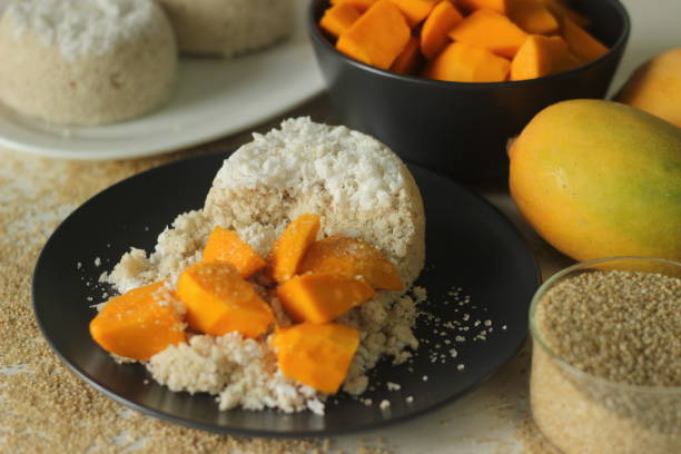 istock Steamed barnyard millet flour cake or barnyard millet puttu served with mango slices and plantains 1365180219