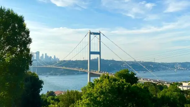view of bosphorus bridge connecting two continents in istanbul city