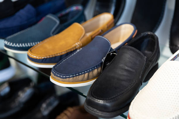 istock Showcase with casual shoes in a  store 1365188710