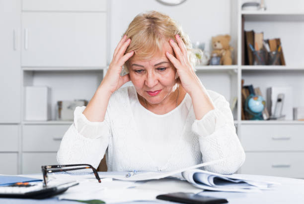 istock Woman engaged in home accounting 1365189756
