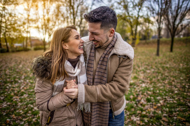 istock Happy couple enjoying outdoors 1365194112