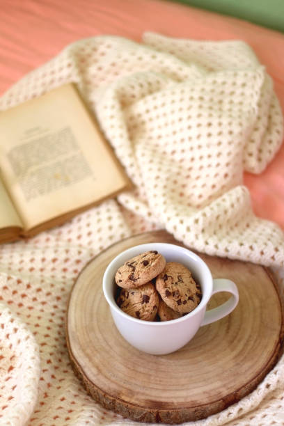 istock Mug with Cookies, Book and Glasses 1365194704