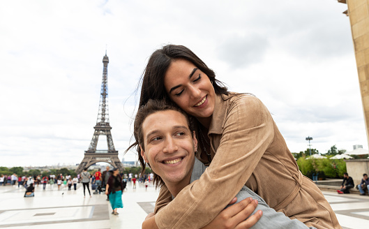 Couple spending some days in vacation to Paris.