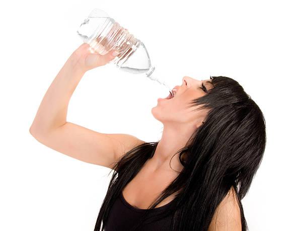 istock gorgeous girl drinking water 136520113