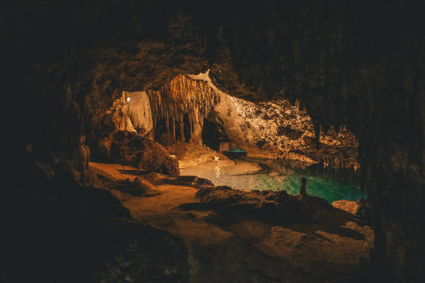 istock underground cenote with stalactites and stalagmites 1365201919