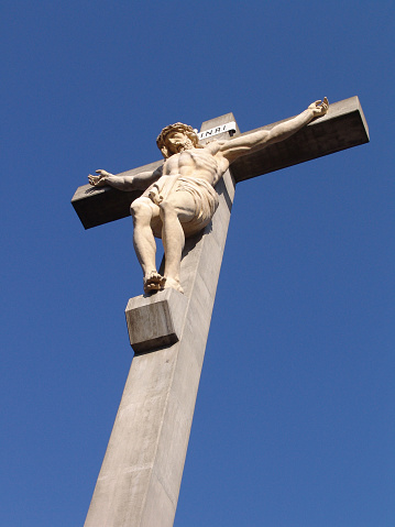 a photo of the Crucifixion of Jesus Christ taken in a cemetery in the Somme region of France.